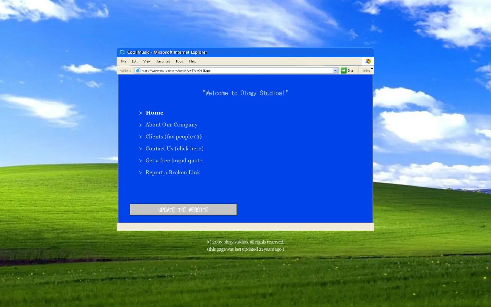Ology Studios retro landing page: a 2003 Windows desktop with a browser window welcoming visitors and an UPDATE THE WEBSITE button